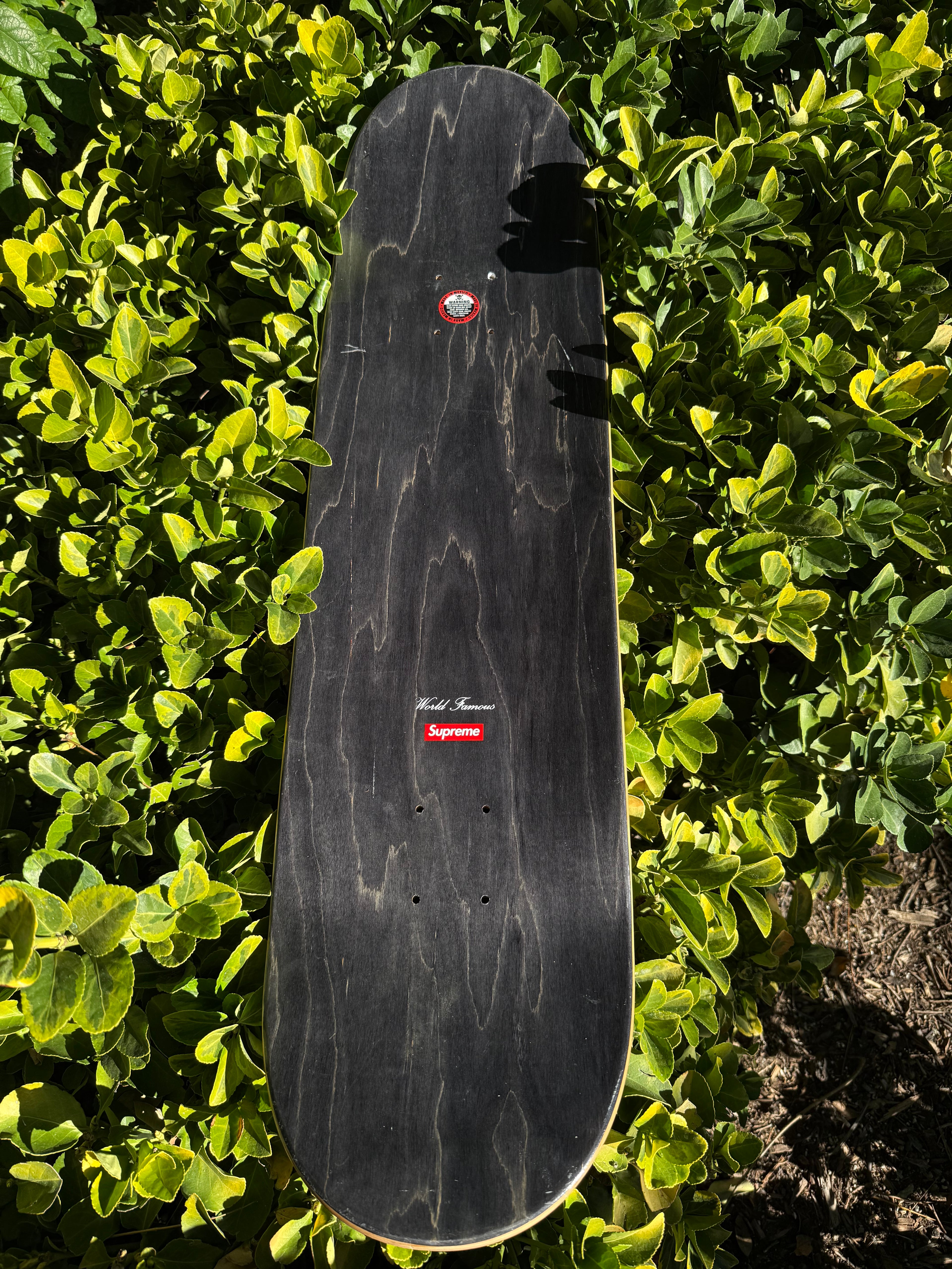 Supreme distorted logo skateboard