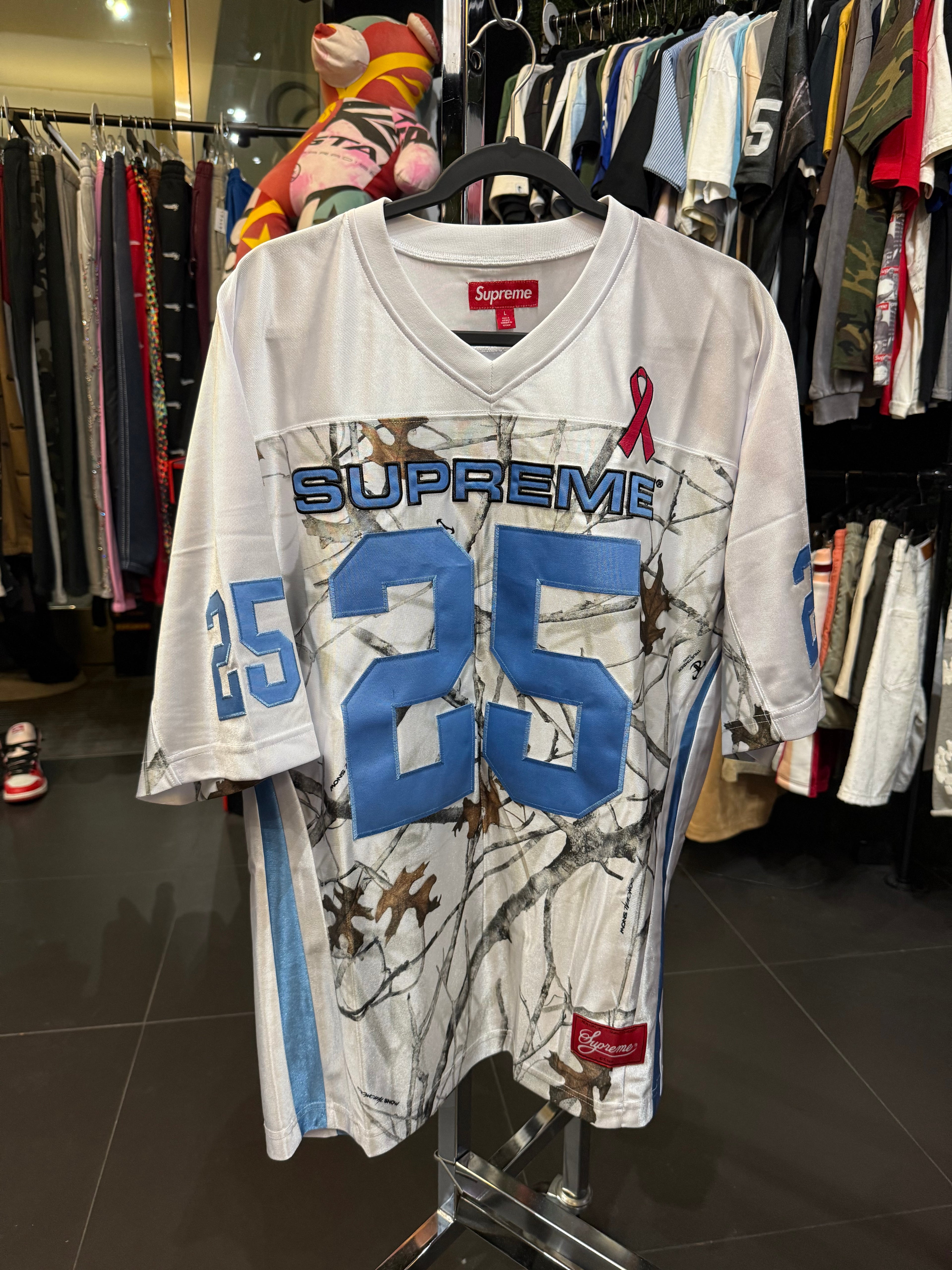 Supreme breast cancer football jersey