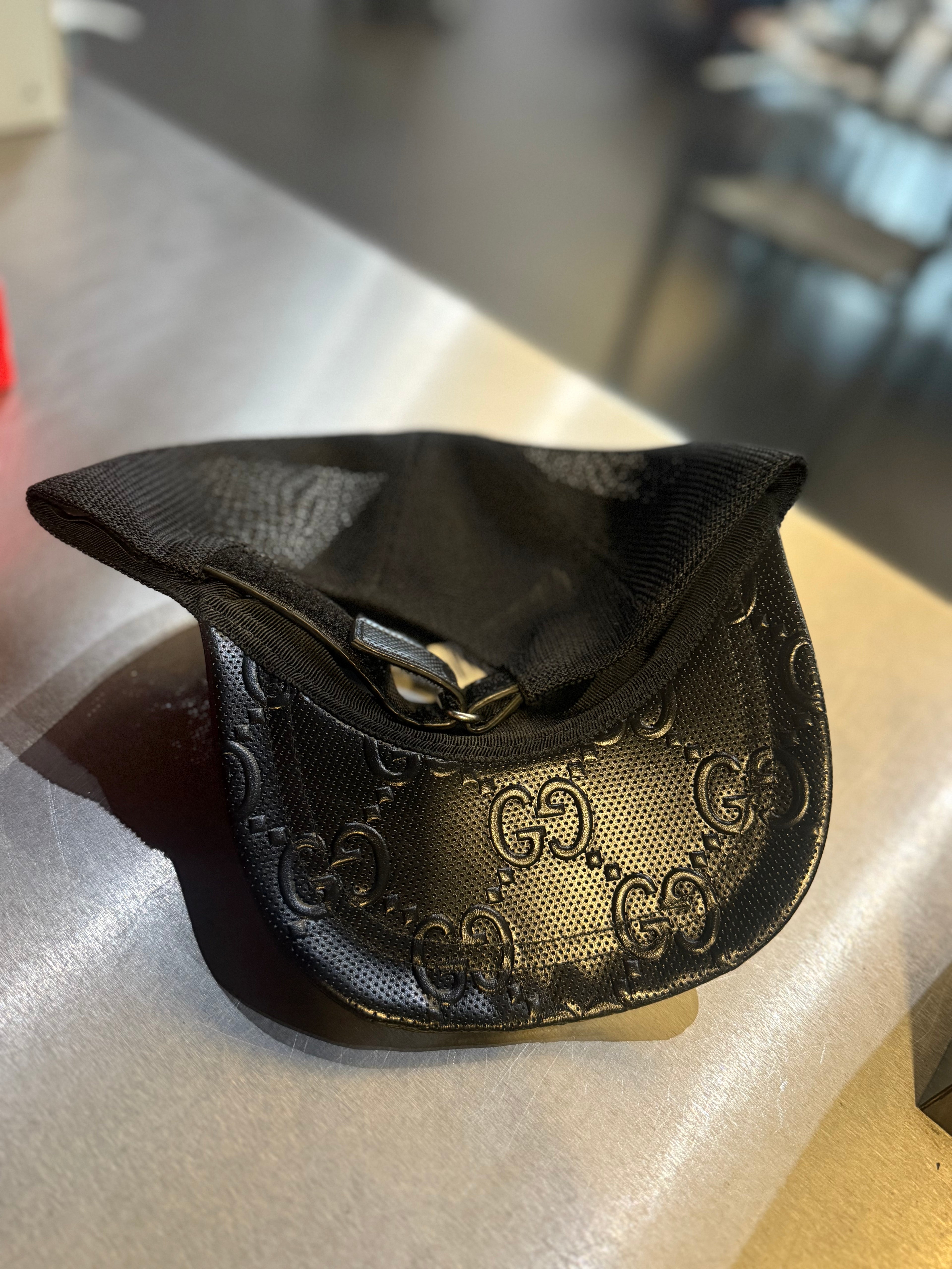 Gucci leather print hat