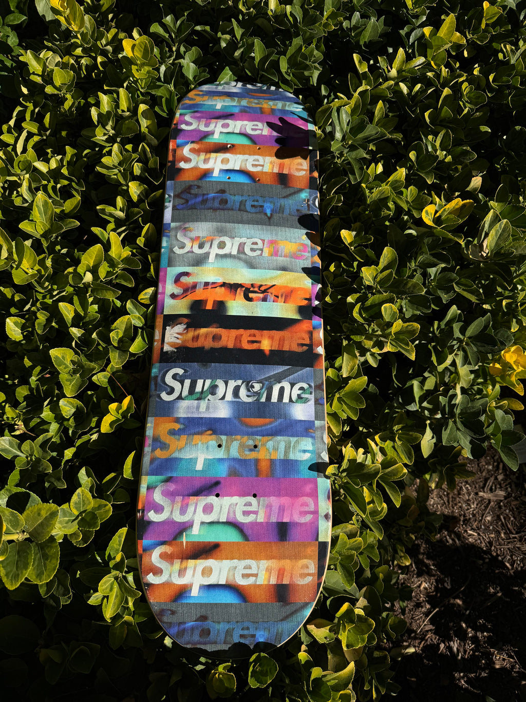 Supreme distorted logo skateboard