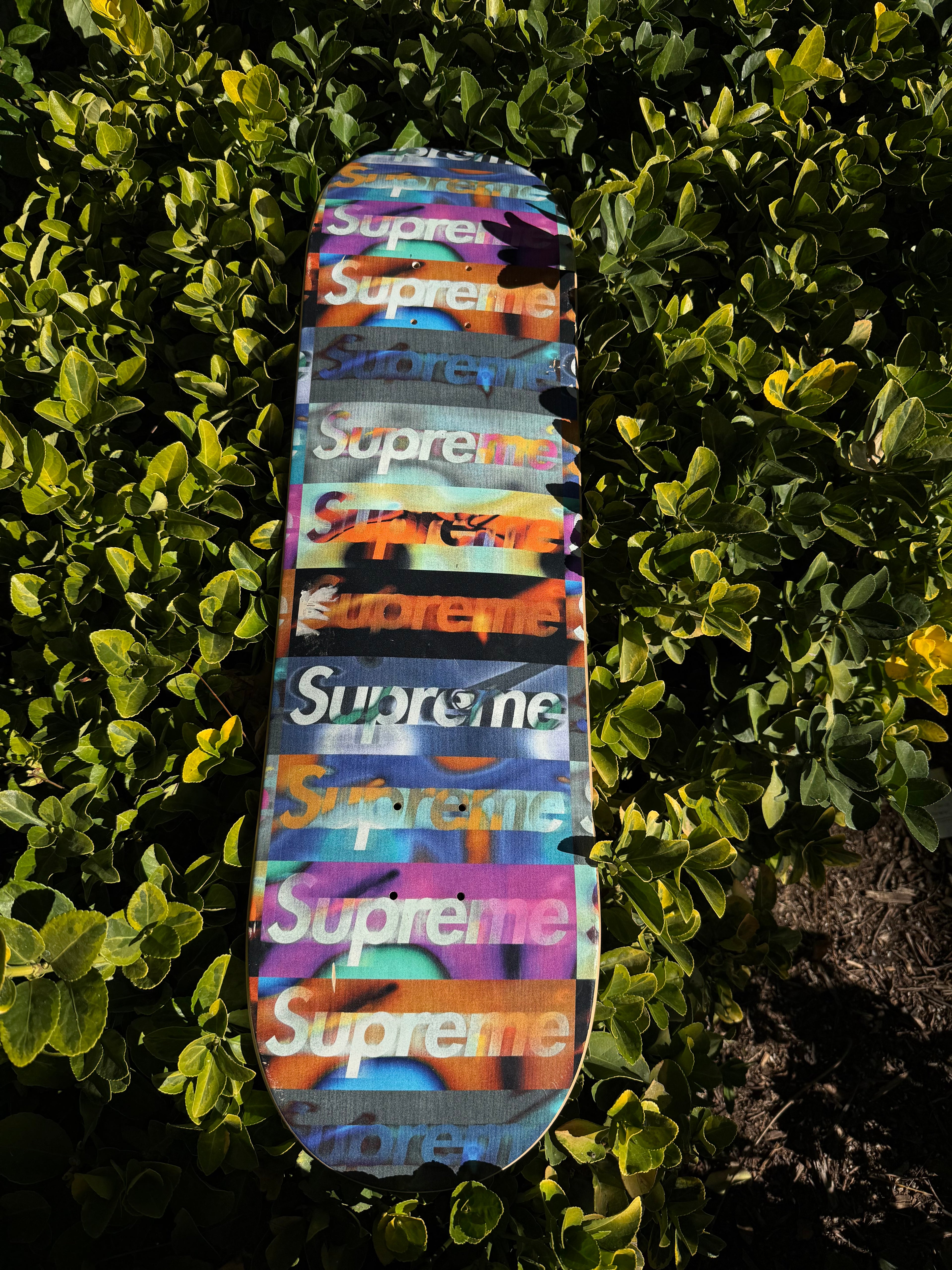 Supreme distorted logo skateboard