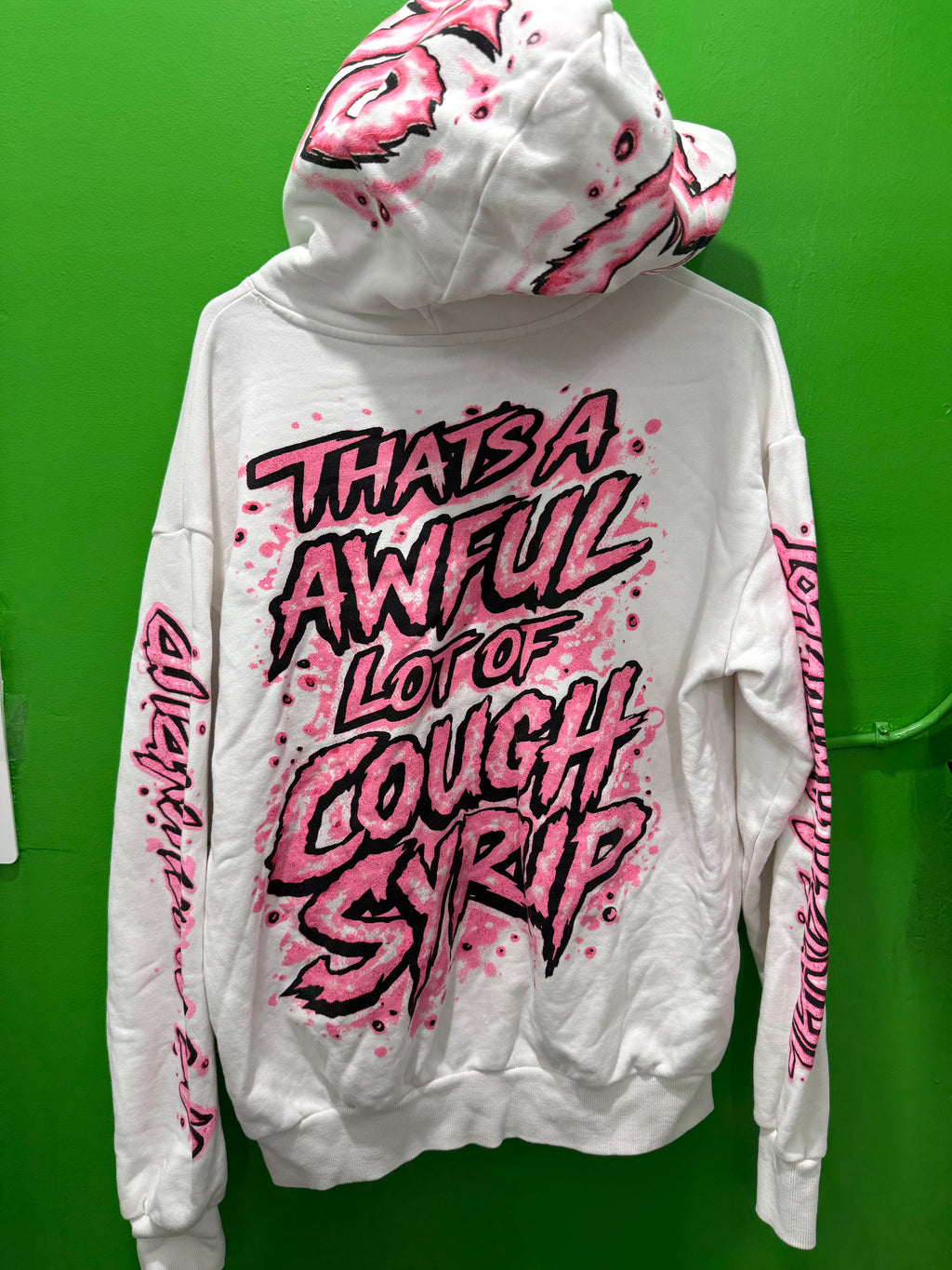 Awful lotta cough syrup white and pink pull over