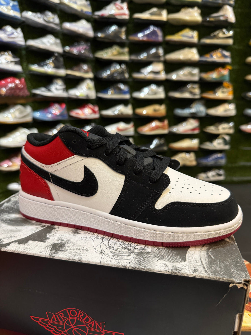 Jordan 1 low black toe