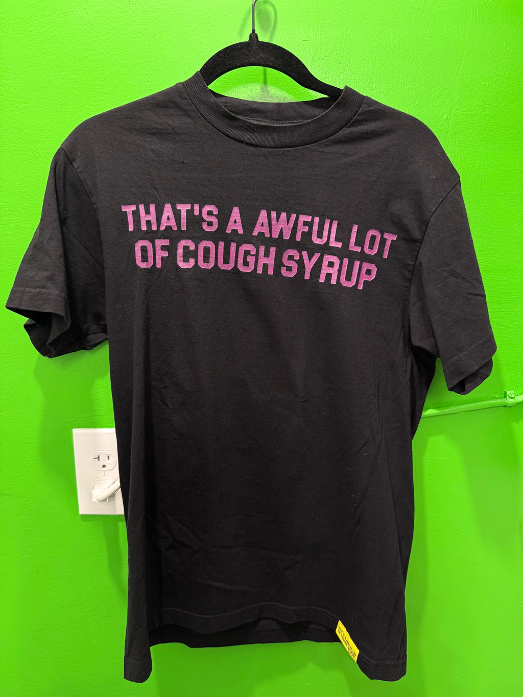 Awful lot of cough syrup, black, and purple ￼